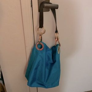 JPK Paris 75 bucket style purse leather strap snap closure